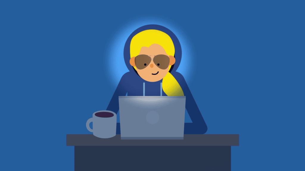 A person using a laptop and taking action to not fall victim to digital fraud, including email scams