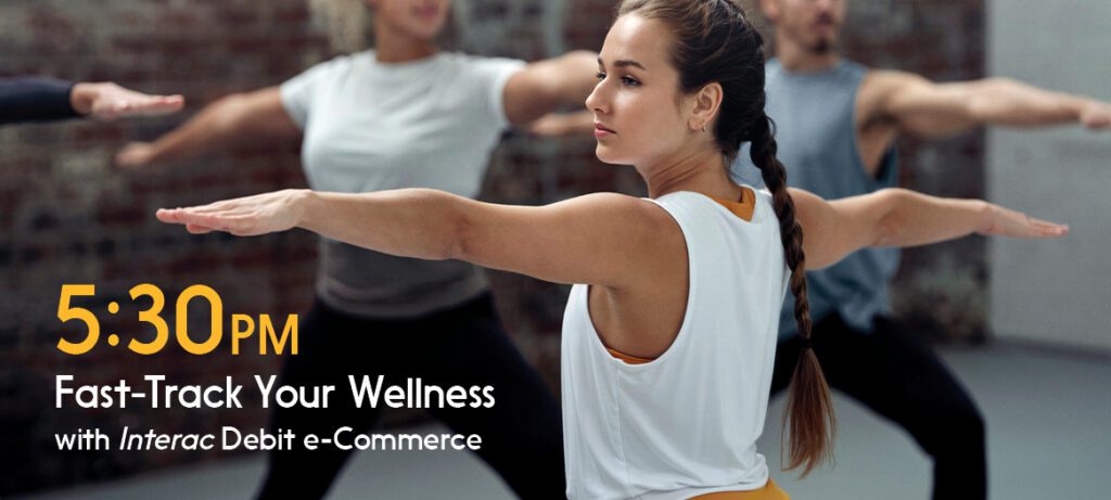 Woman prioritizes wellness with a yoga session she paid for online using Interac Debit e-Commerce. 