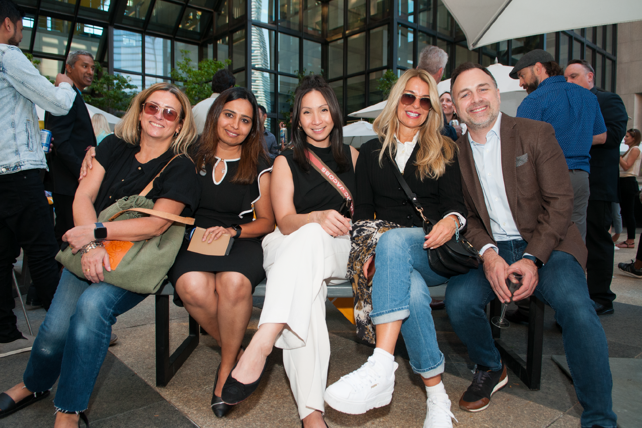 A group of Interac employees smiling.